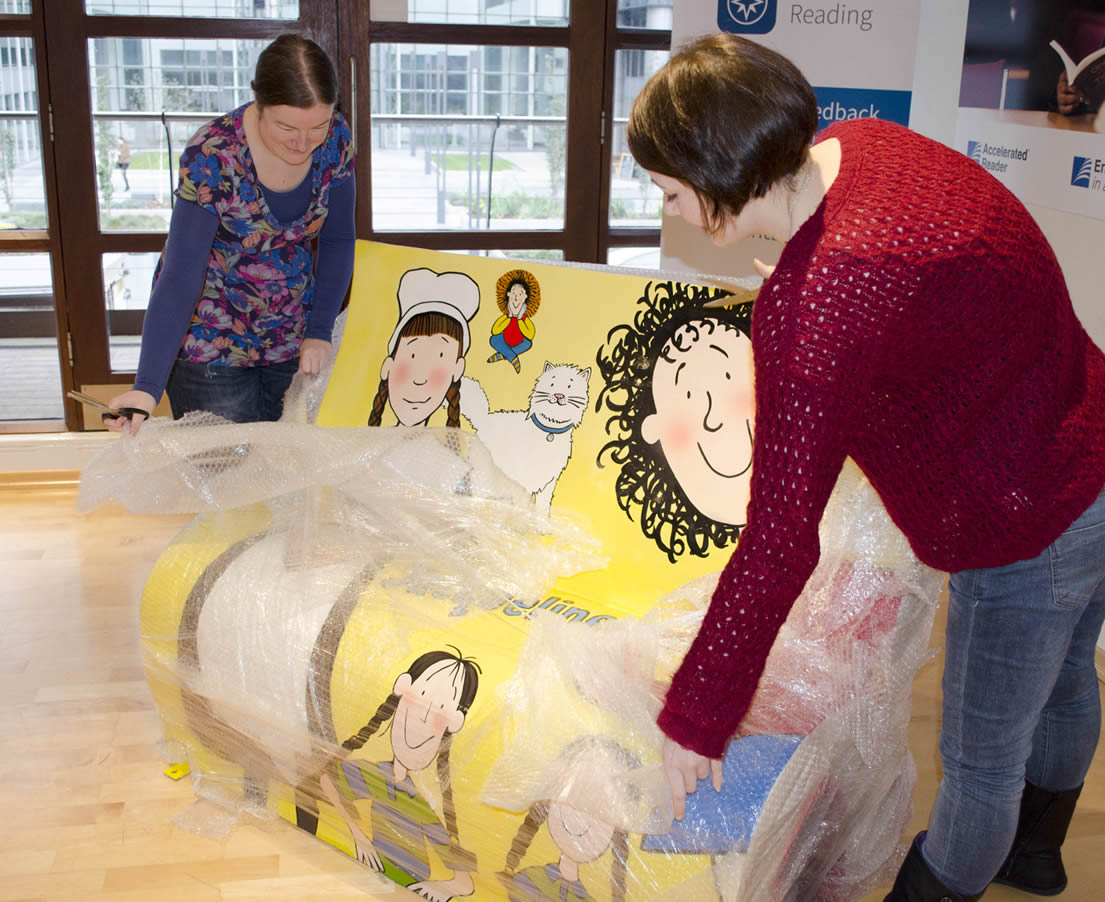 Photo of the Jacqueline Wilson bench being unwrapped