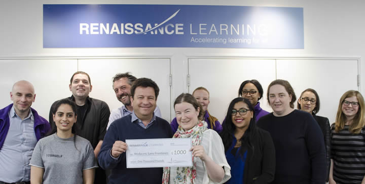 Photo of Renaissance Learning staff with Quizzing for Nepal cheque
