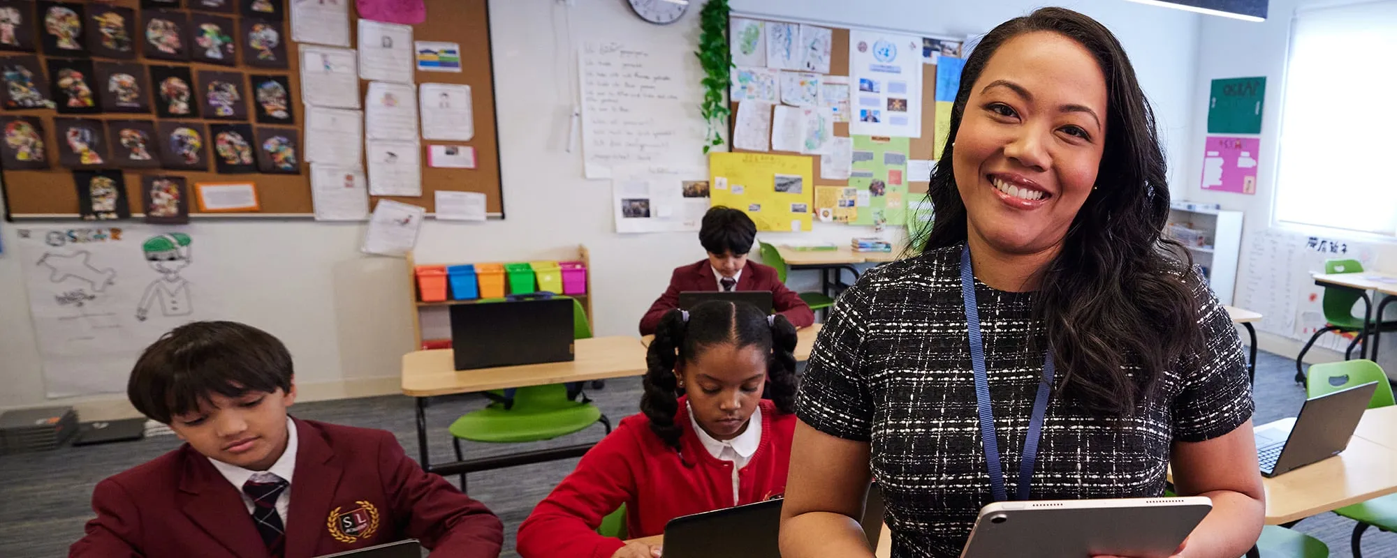 An educator and her pupils in a classroom