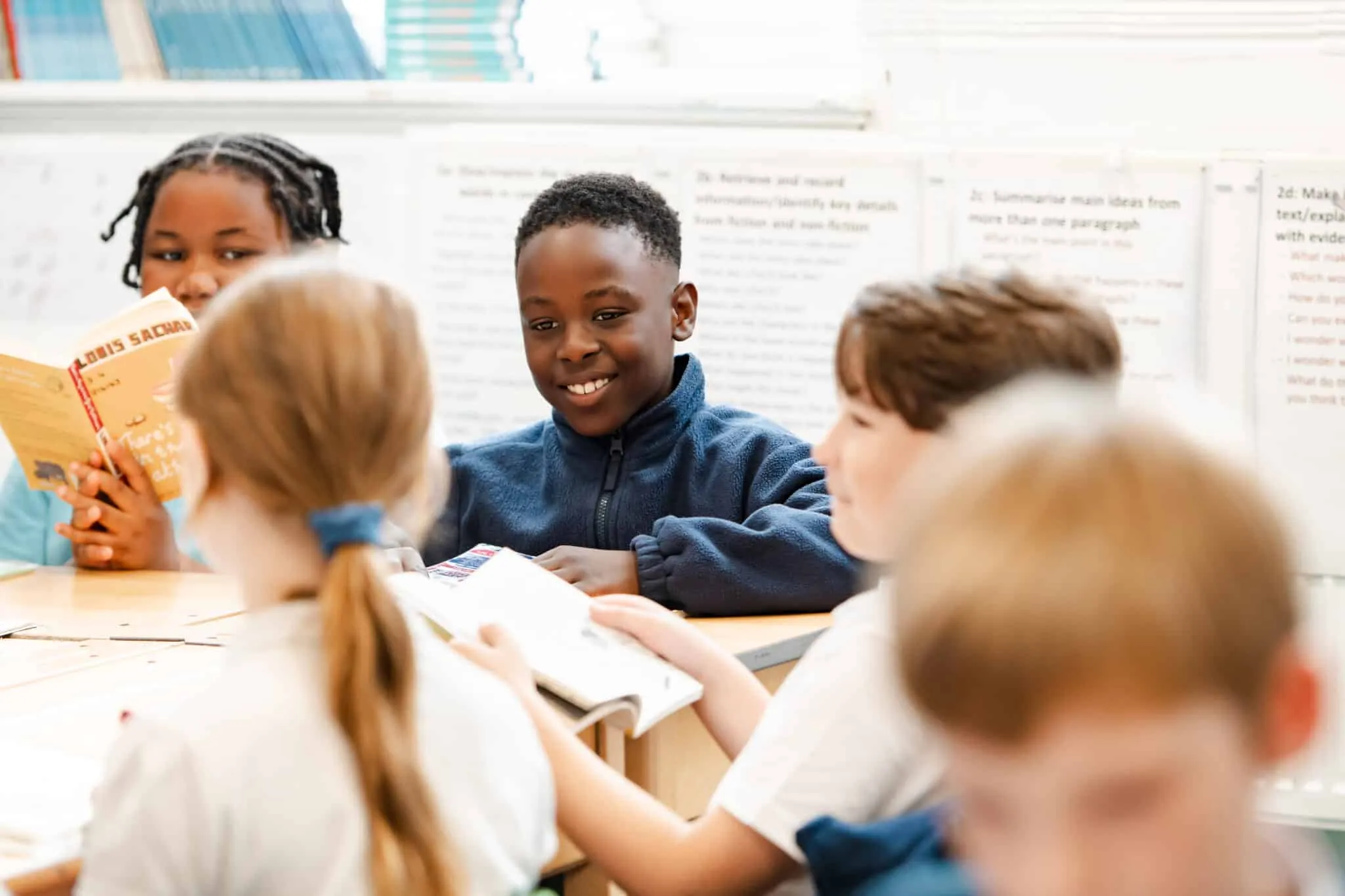 Happy students in classroom