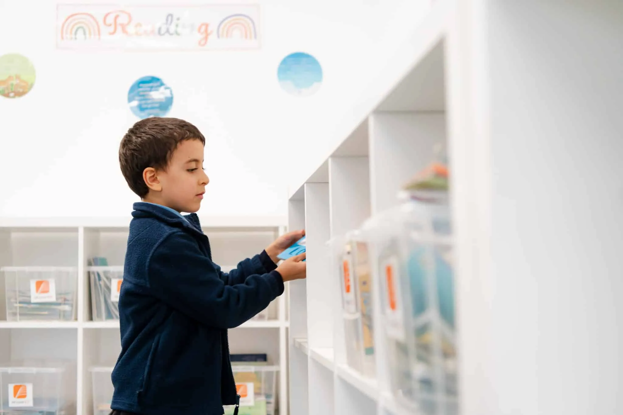 Boy choosing book