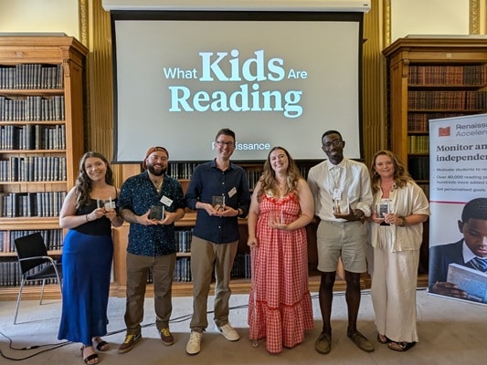 All of the 2025 Quiz Writers' Choice Award winners and representatives, including Lewis Hancox (second left), Simon James Green (centre left), Laura Noakes (centre right), and Jeffrey Boakye (second right)